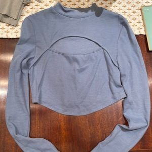 Blue woman’s top with cut out